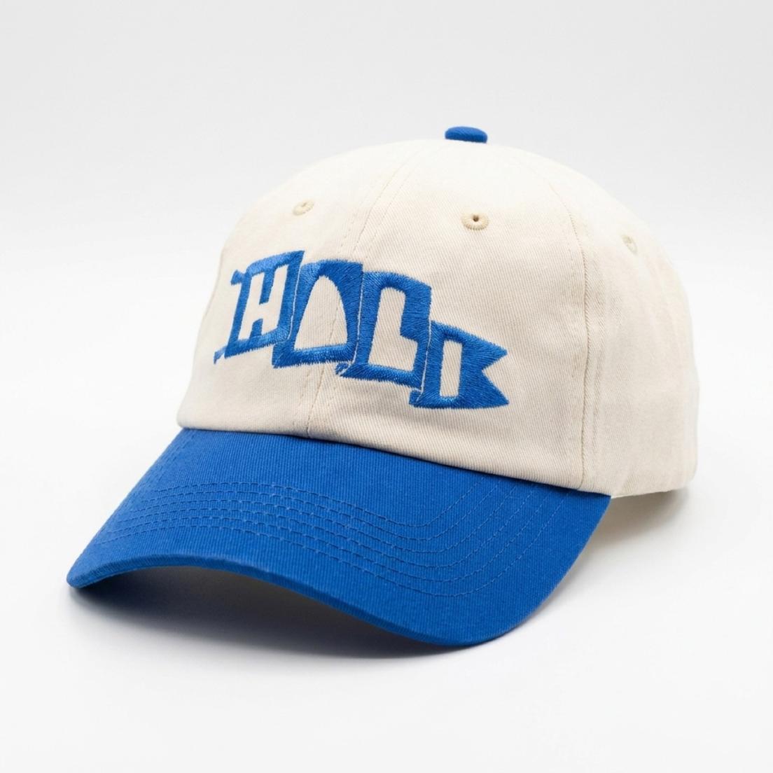 The Hali Hat, cream crown and harbour-blue brim