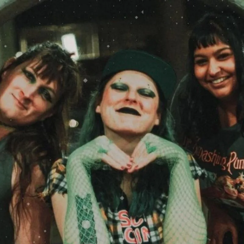 The three members of Amygdala Hijack posing together